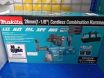 Makita Brushless Rotary Hammer Drill XRH10PTW. Fixed Price $599.99.